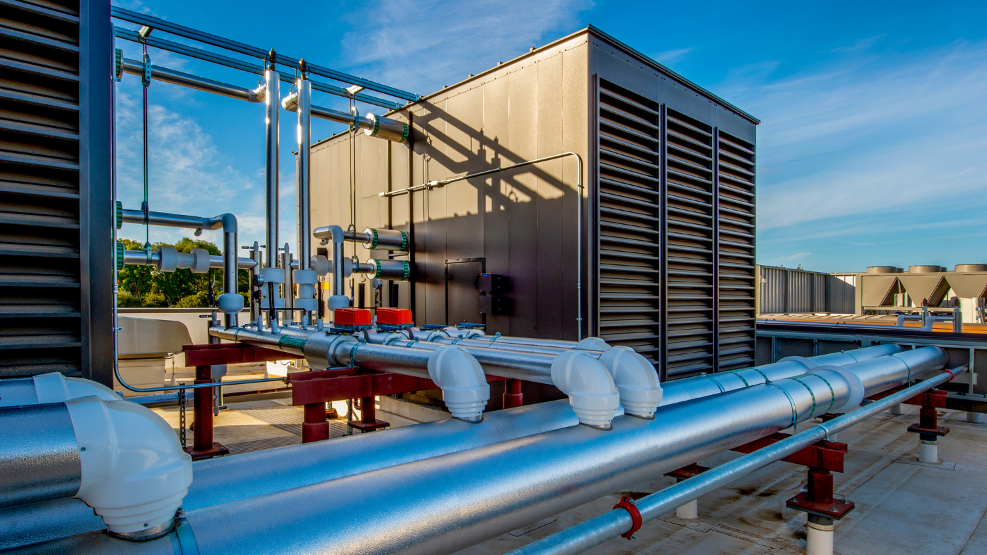 A large metal pipe on top of a building